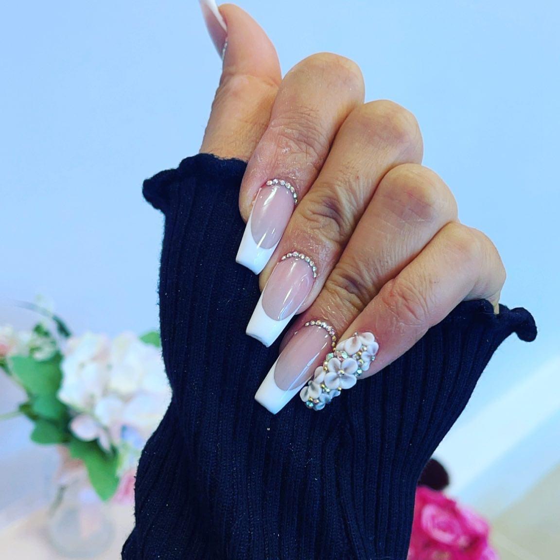 Long French coffin nails with pearl and crystal 3D art