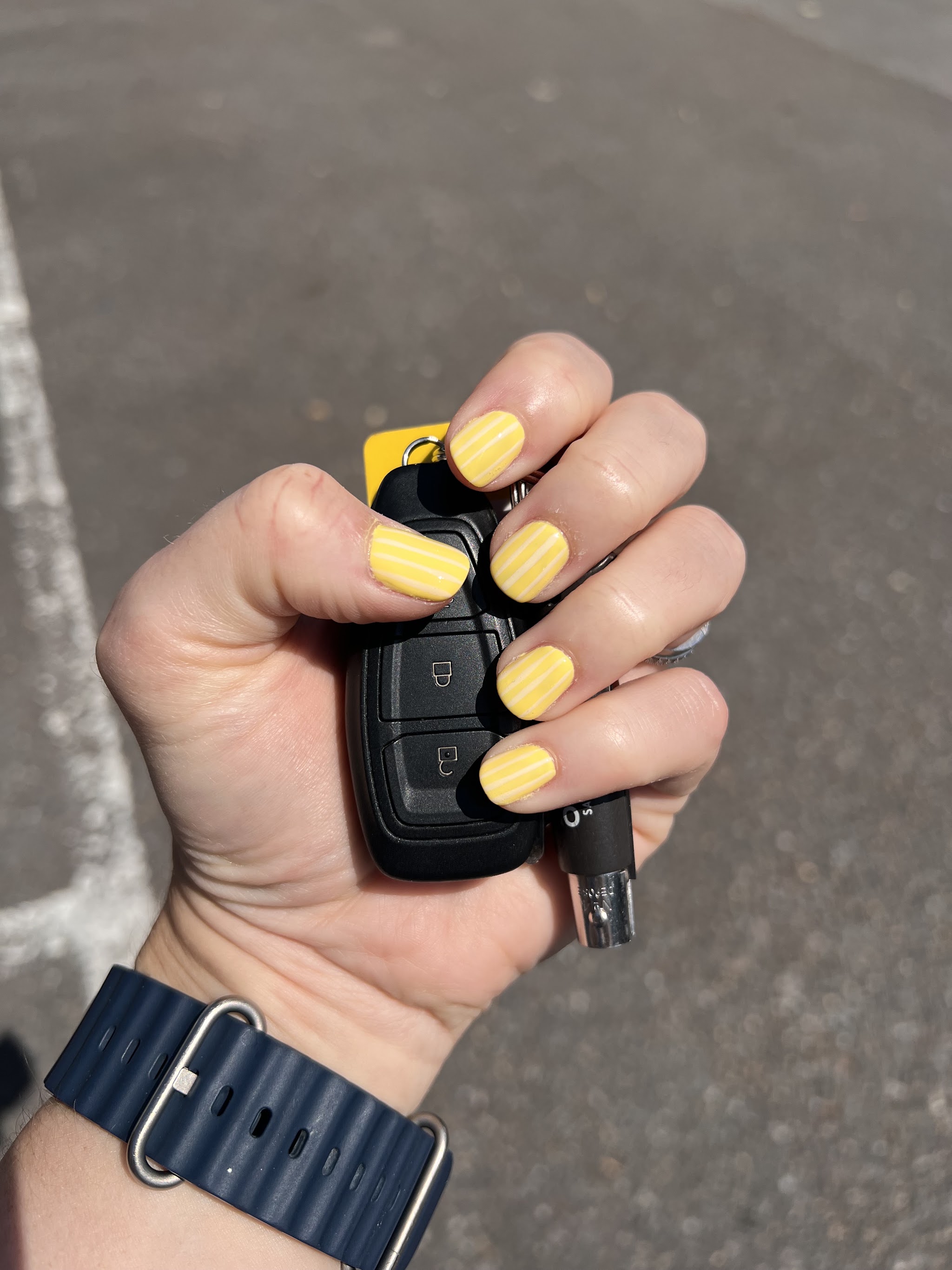 Short yellow gel manicure